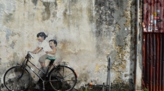 cyclists_streetartpenang_cameraandcarryon-jpg