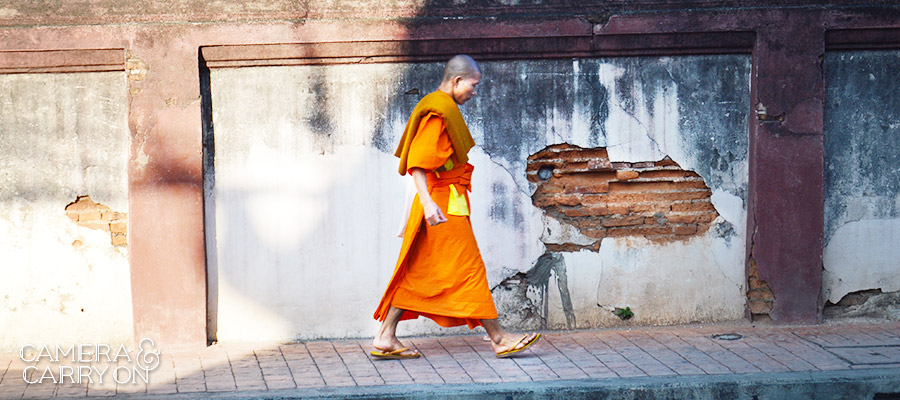 Monk walking in Chiang Mai, Thailand  -- 24 Photos That Will Inspire You to Travel the World NOW | CameraAndCarryOn.com