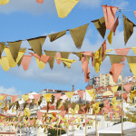 24 Photos That Will Inspire You to Travel the World NOW -- Pendant banners hang high in Portugal's capital, Lisbon #photograph #travel #wanderlust | CameraAndCarryOn.com