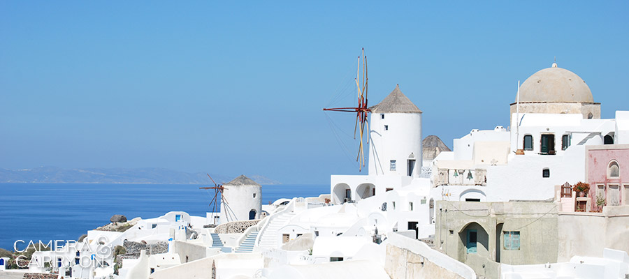 Windmill in Oia, Santorini, Greece -- 24 Photos That Will Inspire You to Travel the World NOW | CameraAndCarryOn.com