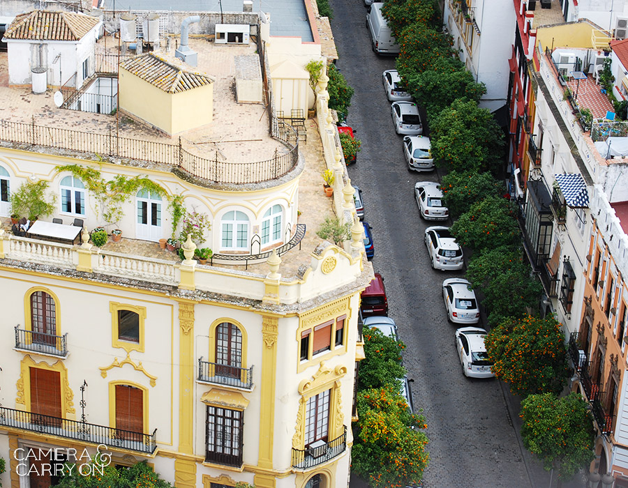 24 Photos That Will Inspire You to Travel the World NOW — Aerial view of Seville, showcasing pretty colors of the city streets #photograph #travel #wanderlust | CameraAndCarryOn.com